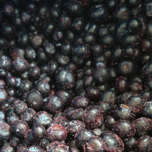 Load image into Gallery viewer, A bunch of frozen blueberries.
